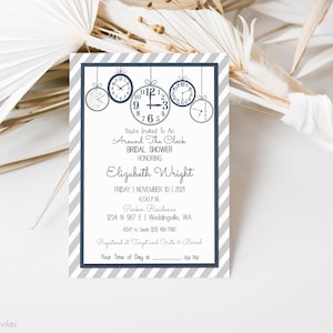 May include: A gray and white striped bridal shower invitation with a navy blue border. The invitation features a design of four clocks hanging from strings. The text on the invitation reads "You're Invited To An Around The Clock Bridal Shower Honoring Elizabeth Wright". The date, time, and location of the shower are also included.