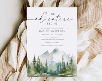 May include: A baby shower invitation with the text "The Adventure Begins." The invitation includes details for Hadley Anderson's baby shower, with a watercolor landscape of mountains and trees. The invitation is on a white background.