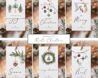 Könnte beinhalten: Sechs druckbare Geschenkanhänger mit rustikalem Weihnachtsmotiv. Die Anhänger zeigen Aquarell-Illustrationen von Weihnachtsbäumen, Ornamenten, Kränzen, Strümpfen und anderen festlichen Elementen. Der Text auf den Anhängern lautet "Wishing You Joy", "Merry Christmas", "Be Merry", "Tis the Season", "Merry Christmas" und "Joyful Noel".