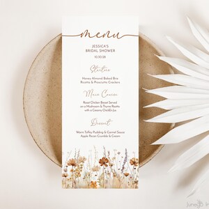 May include: A printable menu card for a bridal shower with a floral design. The menu includes starters, main course, and dessert. The text on the menu card reads "Jessica's Bridal Shower 10.30.28".