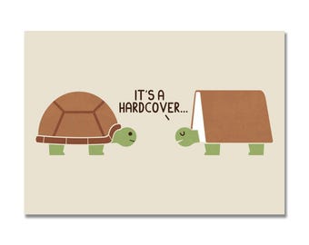 May include: Two cartoon turtles, one with a brown shell and one with a brown book as a shell. The turtle with the book says "It's a hardcover..."
