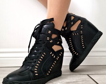 black faux fleece cuff wedge heel trainers