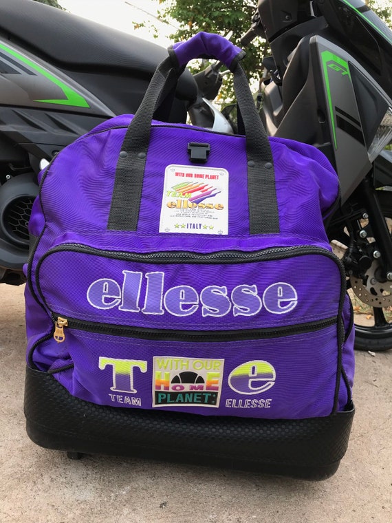 bolsa reebok purpura