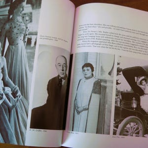 May include: A black and white photograph of a book spread featuring several vintage portraits. The images include a woman with a child, a man in a suit, a woman in a dress, and a person in a carriage. Text is visible.