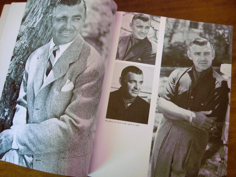 May include: Black and white photographs of Clark Gable in a book. The main image shows Gable in a patterned suit. Other images show Gable in different outfits. Text reads "All photos of Clark Gable taken in 1947."