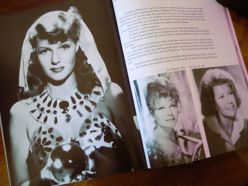 May include: Black and white photograph of a woman with dark hair and a head covering. She wears a decorative collar and a top with floral and dot patterns. The image is from a book.