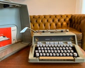 Working Hermes 3000 Typewriter with its original case and manual plus brush