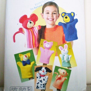 May include: Butterick B4209 sewing pattern envelope for soft stuff hand puppets. The cover features illustrations of a red mouse, blue bear, yellow cat, pink pig, white rabbit, dalmatian dog, and tan monkey puppet designs with a barcode.