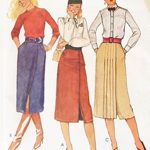 May include: McCall's sewing pattern envelope featuring illustrations of three women in skirts and blouses. The envelope is white with the McCall's logo and the price $1.75. The pattern number is 6710, size 10, waist 25 inches.