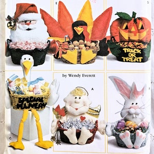 Paniers décoratifs de saison des années 90, porte-gâteries avec visages fantaisistes, citrouille, père Noël, cigogne, lapin, dinde et Cupidon, non coupé Simplicity 7039