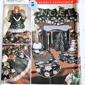 May include: A Simplicity Holiday pattern collection featuring a Christmas angel tree topper and various festive decor items. The cover is red and white with the text "Simplicity Holiday" and "NOEL". The pattern includes a tree skirt and table runner.
