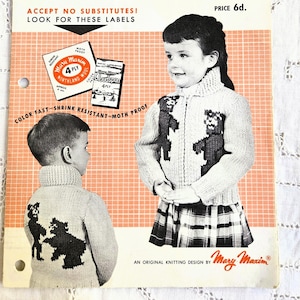 May include: Vintage knitting pattern featuring a child's cardigan with teddy bear designs. The pattern, labeled "Mary Maxim," includes instructions for sizes 4 and 6. The cover displays a black and white illustration of the finished garment.