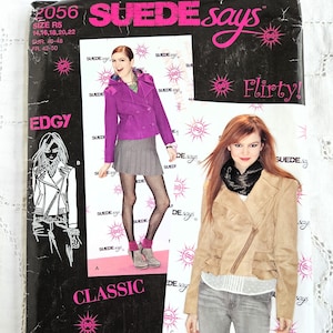 May include: A Simplicity sewing pattern envelope 2056 titled SUEDE says. The black packaging features pink text and graphics, displaying illustrations and photographs of jackets in purple and tan, with size R5 14, 16, 18, 20, 22 listed.
