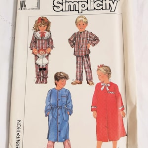 May include: Simplicity sewing pattern number 8325, size 4. The pattern includes instructions for making pajamas and a robe for children. The pattern shows four different outfits: a red and white plaid pajama set with a ruffled collar, a red and white plaid pajama set with a button-up collar, a blue robe with a white belt, and a red robe with a white bow.