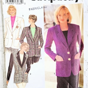 May include: Simplicity sewing pattern for blazers. The package features illustrations of different blazer styles, including a purple blazer with star-shaped buttons and a black and white checkered blazer. The package also includes the text "FABRICLAND".