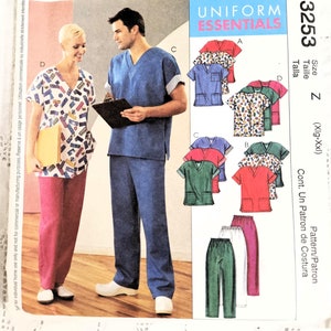 May include: McCall's sewing pattern for Uniform Essentials, featuring scrubs and trousers. The pattern includes various scrub top designs, including solid colours and patterned options. The image shows a model wearing a blue scrub set and another wearing a patterned scrub top with pink trousers.