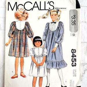 80s Granny Chic Girls' Dress, Gathered to Yoke, Collar and Sleeve Variations, Hemline Ruffle, UNCUT McCall's 8453, Girl Size M (8-10)