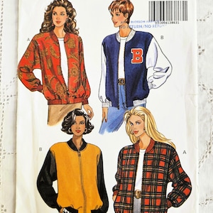 May include: Butterick pattern 6284 featuring four bomber jacket designs. The jackets include a red paisley print, a navy blue and white letterman style, a yellow and black color block, and a red plaid pattern.