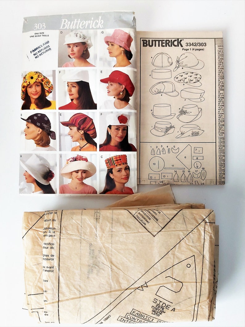 Puede incluir: Un patr&oacute;n de costura vintage para un sombrero, que presenta una variedad de estilos. El patr&oacute;n es de Butterick y est&aacute; etiquetado como 3342/303. El patr&oacute;n incluye instrucciones y diagramas para hacer diferentes tipos de sombreros, incluyendo un sombrero cloche, un sombrero de sol y una boina.