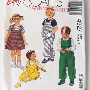 May include: A sewing pattern for children's dungarees. The pattern includes three different styles of dungarees: striped, green, and yellow. The pattern is for size 4 and is from McCall's Easy Fanny Fabric.