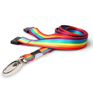 May include: A rainbow lanyard with a silver swivel hook. The lanyard is made of a woven fabric with red, orange, yellow, green, blue, indigo, and violet stripes.