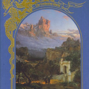 May include: A book cover with a gold dragon design and the title "The Enchanted World: Fabled Lands". The cover is blue with a gold border and a picture of a fantasy landscape with mountains, clouds, and a castle.