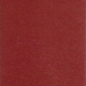 May include: A burgundy book cover with gold trim. The title "Mister Johnson" is printed in white at the top of the cover. The author's name, "Joyce Cary", is printed in white at the bottom of the cover.