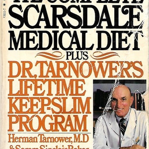 May include: Book cover with a white background and black text. The title is "The Complete Scarsdale Medical Diet Plus Dr. Tarnower's Lifetime Keep-Slim Program". The author is Herman Tarnower, M.D. & Samm Sinclair Baker. The cover also features a photo of a man in a white lab coat.