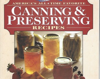 May include: A book cover with a red background and the title "Better Homes and Gardens presents America's All-Time Favorite Canning & Preserving Recipes". The cover features a still life of jars of preserved fruit and vegetables.