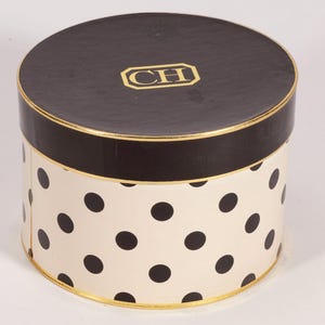 Contenedor de cartón redondo vacío vintage de Carolina Herrera para esencias de primavera