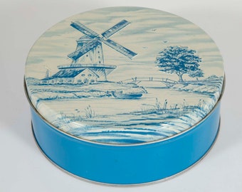 Jolie boîte métallique ronde bleue et blanche en relief vintage - Scène hollandaise avec moulin à vent