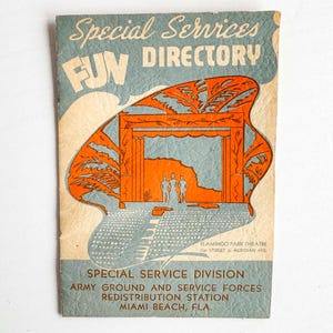 May include: Vintage "Special Services FUN Directory" booklet. The cover features a blue and orange illustration of a theater stage with palm trees. Text includes "Flamingo Park Theatre" and "Miami Beach, Fla."