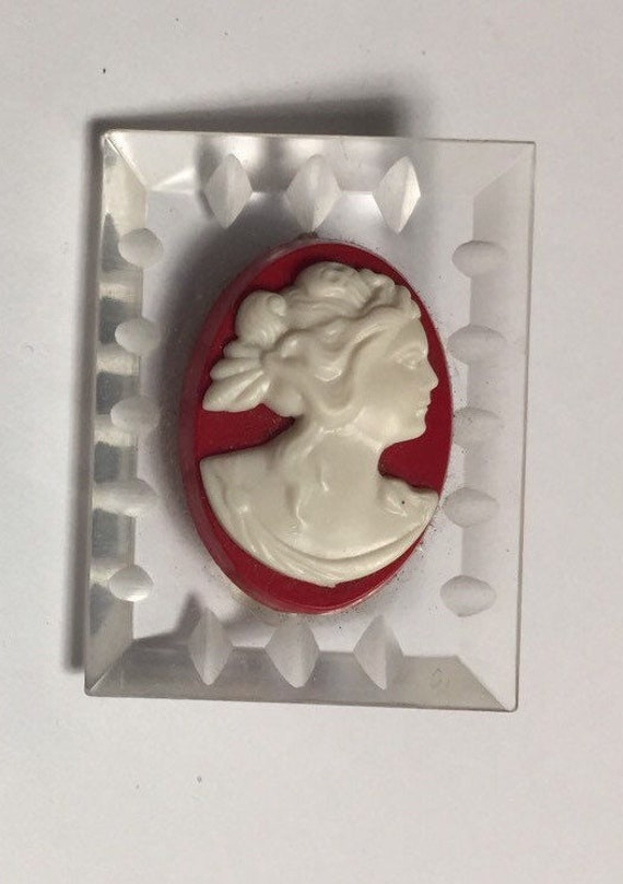 Vintage Clear Reversed Carved Red Cameo Brooch