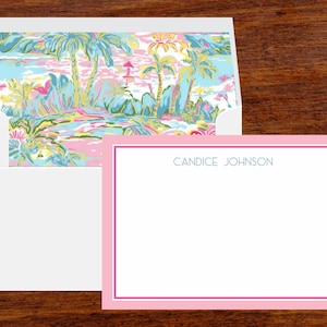 May include: Pink stationery card with a light blue border and the name "CANDICE JOHNSON" printed in light blue at the top. The card has a white background and is blank for writing.