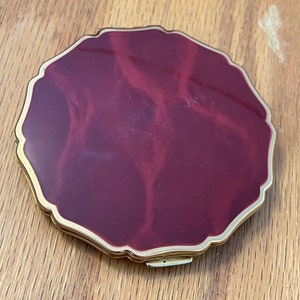 Vintage 1960-70’s Shaklee Maroon makeup compact from England