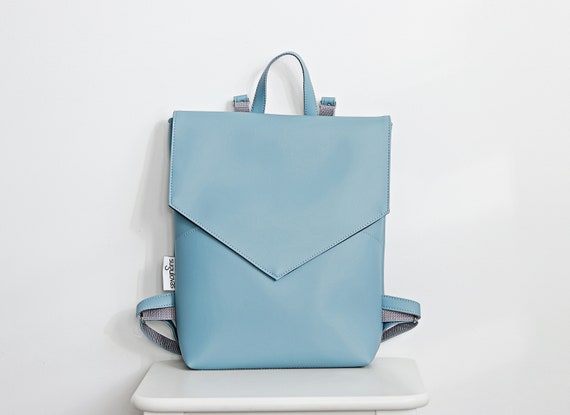 black leather flap over backpack Piel Leather Flap-Over Tablet Backpack