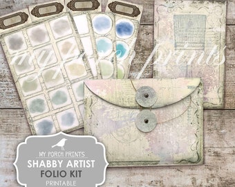 May include: Printable Shabby Artist Folio Kit by My Porch Prints. The kit includes a set of watercolor swatches, a paintbrush envelope, and a label that says "Shabby Artist Folio Kit Printable".