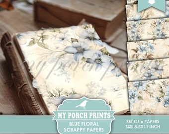 May include: A set of six printable digital papers featuring a blue floral design. The papers are 8.5 inches by 11 inches and are perfect for scrapbooking, junk journaling, and other crafting projects.