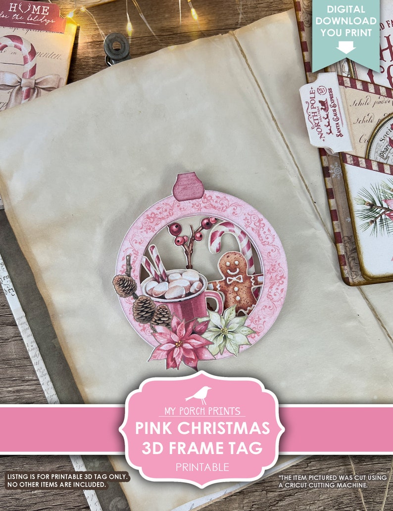 Puede incluir: Etiqueta de marco 3D de Navidad rosa imprimible con un hombre de jengibre, bastones de caramelo y una taza de chocolate caliente. La etiqueta est&aacute; decorada con poinsettias y acebo.