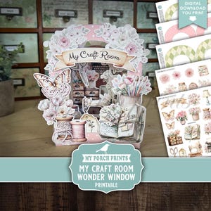 May include: A paper craft scene with the text "My Craft Room" on a banner. The scene features paper butterflies, flowers, spools of thread, and craft supplies. The image also includes printable digital downloads.