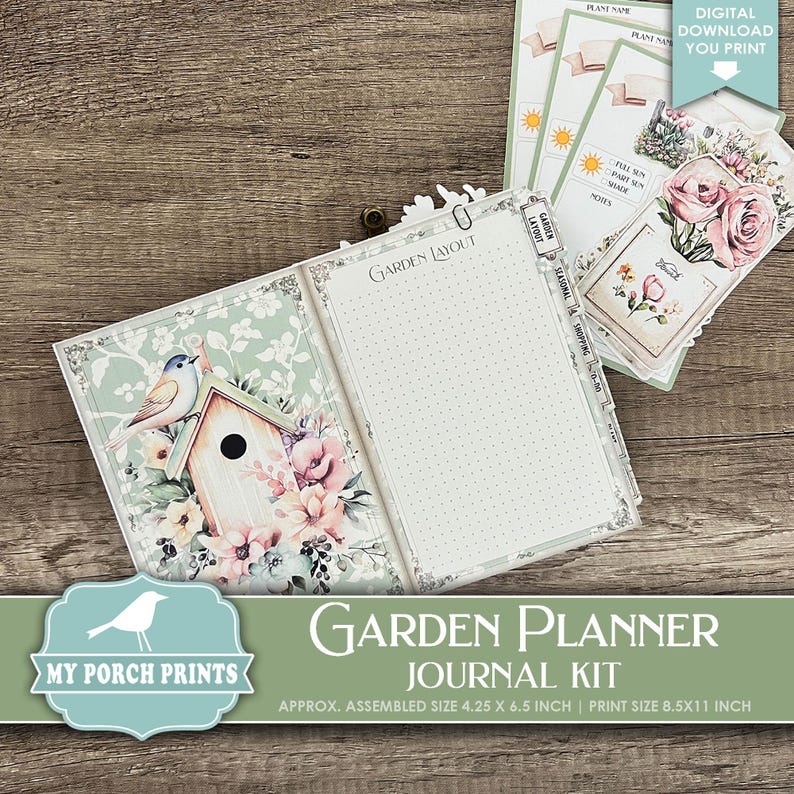 May include: A garden planner journal kit with a birdhouse and floral design. The journal is open, revealing lined pages and tabs labeled "Garden Layout," "Seasonal," and "Shopping." Includes printable plant name cards. Assembled size is approximately 4.25 x 6.5 inches.