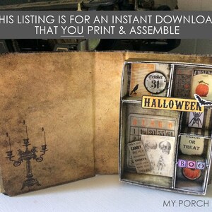 Puede incluir: Proyecto de manualidades de caja de libro imprimible con tem&aacute;tica de Halloween. La caja est&aacute; abierta para revelar una variedad de im&aacute;genes y texto con tem&aacute;tica de Halloween, que incluyen "Octubre 31", "Halloween", "Bingo", "Candy Boo", "Ghosts", "Or Treat" y "Boo".