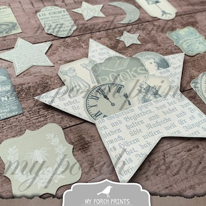 Puede incluir: Un inserto de bolsillo imprimible para una p&aacute;gina de &aacute;lbum de recortes en forma de estrella. El inserto presenta una variedad de im&aacute;genes de estilo vintage, que incluyen un reloj, un libro y un conejo. El texto "My Porch Prints" y "Star Pocket Insert Printable" tambi&eacute;n est&aacute; incluido.