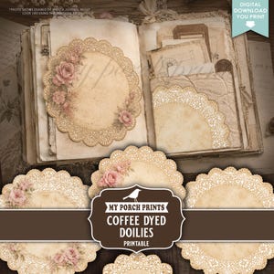 May include: A collection of printable coffee-dyed paper doilies featuring intricate lace-like edges and soft pink rose illustrations. The set includes circular and semi-circular designs with a vintage aesthetic, displayed on an open journal page.