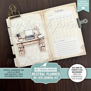 May include: A neutral planner kit with a desk illustration, calendar, and space for notes. The assembled size is approximately 4.25 x 6.5 inches. The print size is 8.5 x 11 inches. Includes the text "My Porch Prints Neutral Planner No-Sew Journal Kit".