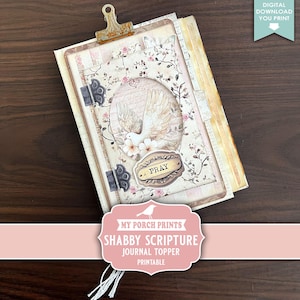May include: A vintage-style journal with a decorative cover featuring a dove, floral accents, and the word "PRAY." The journal is held together with a rusty clip and decorative hinges. The image includes the text "DIGITAL DOWNLOAD YOU PRINT" and "SHABBY SCRIPTURE JOURNAL TOPPER PRINTABLE."