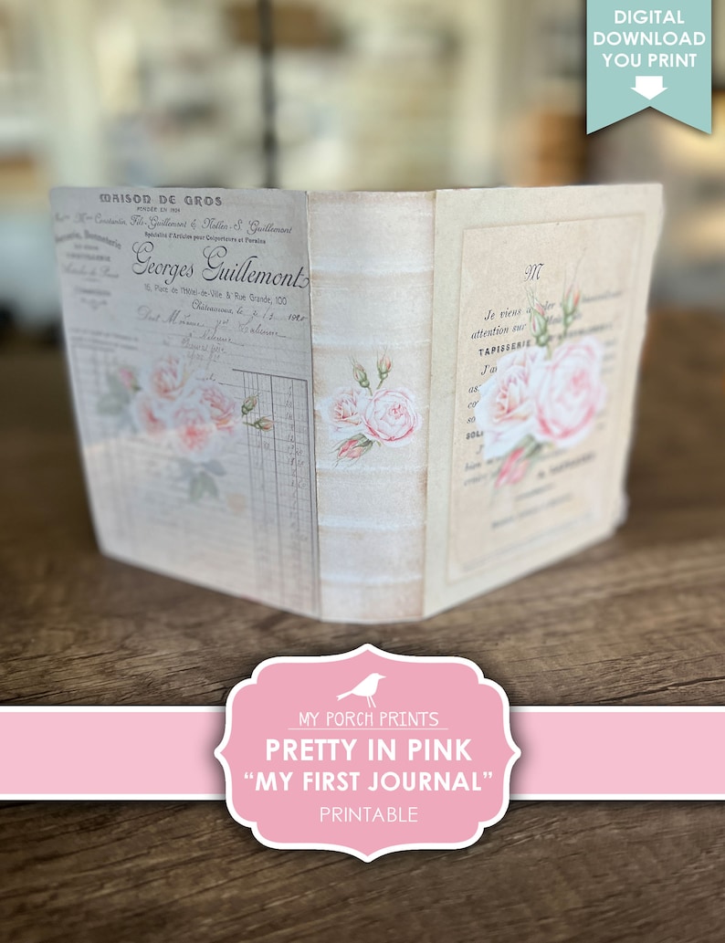 Op de afbeelding: Printbare journalomslag met een vintage ontwerp met roze rozen en Franse tekst. De tekst luidt "Maison de Gros" en "Georges Guillemont". De titel "Pretty in Pink" en "My First Journal" zijn gedrukt op een roze banner.