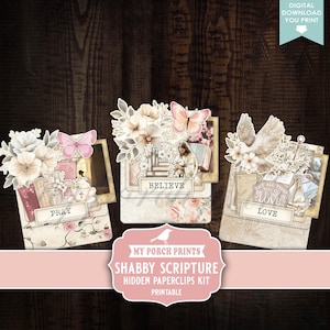 May include: A digital download printable kit featuring three shabby scripture hidden paperclips. Each paperclip is decorated with floral arrangements, butterflies, and religious imagery. The words "PRAY", "BELIEVE", and "LOVE" are visible.