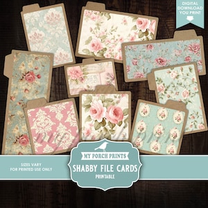 May include: A white ceramic mug with a black handle and the text "But First, Coffee" in a black, bold font. The mug is on a white surface.