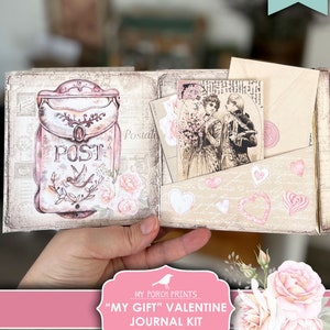 May include: Printable Valentine's Day journal kit with a vintage aesthetic. The kit features a pink mailbox, a floral design, and the text "My Gift" Valentine Journal Kit Printable.